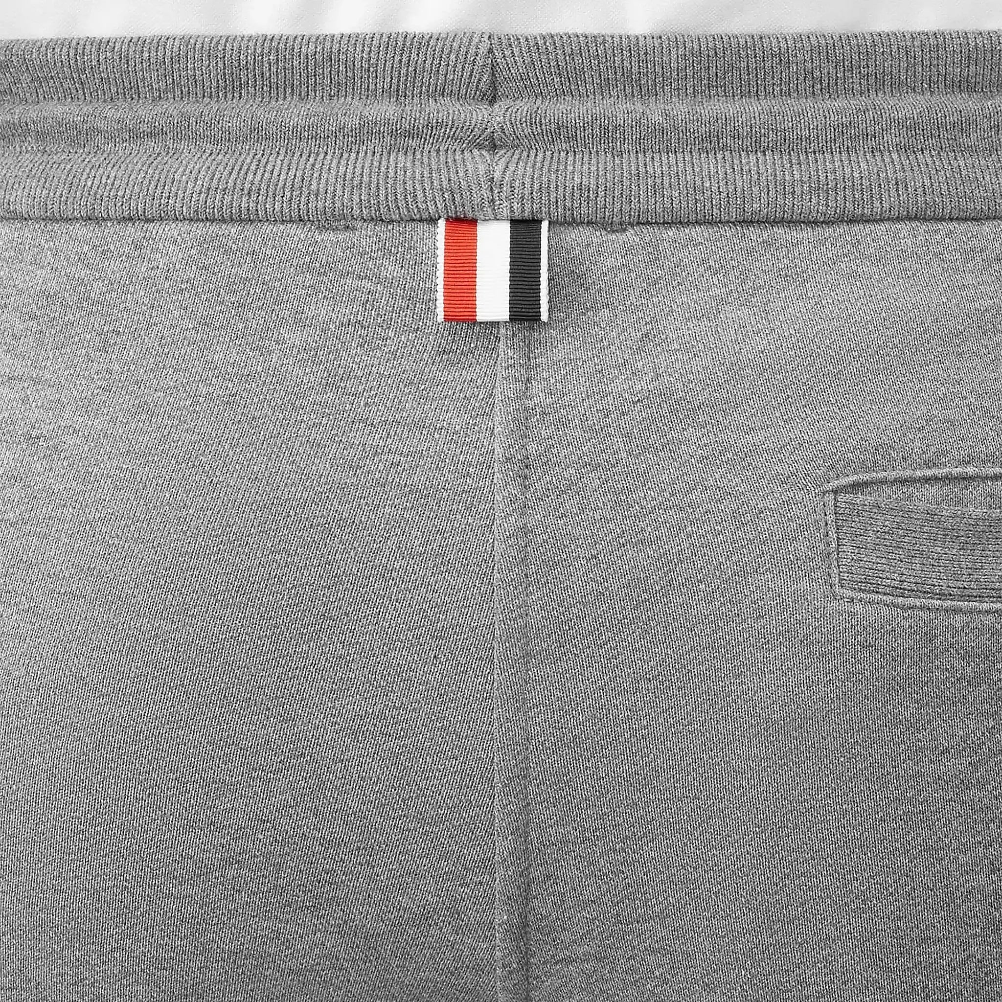 Back detail view of Thom Browne Classic Loopback 4-Bar Grey Sweat Shorts MJQ012H-00535-068